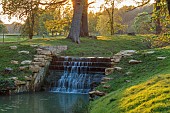 COTTESBROOKE HALL AND GARDENS, NORTHAMPTONSHIRE: SPRING, TREES, CASCADE, PARKLAND, SUNSET