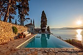 KOULOURA, CORFU, GREECE: DESIGNER PAUL BANGAY: THE SWIMMING POOL, SUNRISE