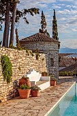 KOULOURA, CORFU, GREECE: DESIGNER PAUL BANGAY: POOL, POOL HOUSE AND SEAT, BENCH