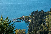 KOULOURA, CORFU, GREECE: DESIGNER PAUL BANGAY: LOOKING DOWN ON HARBOUR AND VILLA OF KOULOURA
