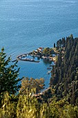 KOULOURA, CORFU, GREECE: DESIGNER PAUL BANGAY: LOOKING DOWN ON HARBOUR AND VILLA OF KOULOURA