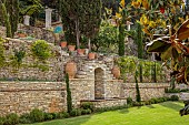 KOULOURA, CORFU, GREECE: DESIGNER PAUL BANGAY: LAWN, WALLS, FOUNTAIN, TERRACOTTA CONTAINERS
