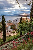 KOULOURA, CORFU, GREECE: DESIGNER PAUL BANGAY: VIEW OF VILLA FROM UPPER TERRACE, SUNRISE