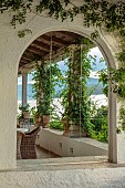 KOULOURA, CORFU, GREECE: DESIGNER PAUL BANGAY: MIRROR ON BALCONY COURTYARD