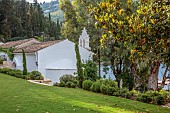 KOULOURA, CORFU, GREECE: DESIGNER PAUL BANGAY: LAWN, CHURCH