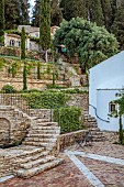 KOULOURA, CORFU, GREECE: DESIGNER PAUL BANGAY: COURTYARD, TERRACE, COURTYARD, WALLS, TERRACOTTA CONTAINERS, STAR JASMINE, TRACHELOSPERMUM JASMINOIDES, CHURCH