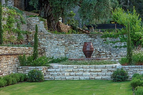 KOULOURA_CORFU_GREECE_DESIGNER_PAUL_BANGAY_LAWN_WALLS_TERRACES_WATER_FEATURE_TERRACOTTA_CONTAINERS