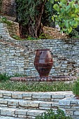 KOULOURA, CORFU, GREECE: DESIGNER PAUL BANGAY: WALLS, TERRACES, WATER FEATURE, TERRACOTTA CONTAINERS, STEPS