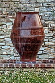 KOULOURA, CORFU, GREECE: DESIGNER PAUL BANGAY: WALLS, WATER FEATURE, TERRACOTTA CONTAINERS