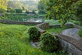 CAISSON GARDEN, SOMERSET: MEADOW, VIEW TO THE POUND, A DEEP POND, WALLS, LANE