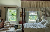 PRIORS MARSTON, WARWICKSHIRE, THE MANOR HOUSE: GUEST BEDROOM, CREAM, BLUE AND MAHOGANY, FOUR POSTER BED