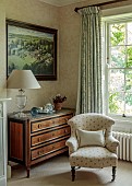 PRIORS MARSTON, WARWICKSHIRE, THE MANOR HOUSE: GUEST BEDROOM, CREAM, BLUE AND MAHOGANY, PAINTING OF THE MANOR HOUSE BY JONATHAN MYLES-LEA IN 2011