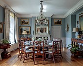 PRIORS MARSTON, WARWICKSHIRE, THE MANOR HOUSE: THE FORMAL DINING ROOM, PALE BLUE, CANDELABRA, DINNER SERVICE HAND PAINTED BY DEBORAH SEARS, ISIS CERAMICS