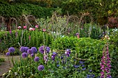 PRIORS MARSTON, WARWICKSHIRE, THE MANOR HOUSE: MAY, THE KITCHEN GARDEN, VEGETABLE GARDEN, POTAGER, PEONIES, FOXGLOVES, ALLIUMS, WALLED GARDEN, CUTTING GARDEN