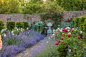 THE MANOR HOUSE, BLEDLOW, BUCKINGHAMSHIRE: MAY, THE WALLED KITCHEN, VEGETABLE GARDEN, PEONIES, CATMINT, PATH, URN, ROSE HIGHGROVE