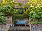 THE MANOR HOUSE, BLEDLOW, BUCKINGHAMSHIRE: MAY, SUNKEN POOL GARDEN, WALLS, FOUNTAIN, SCULPTURE BY MAX MADDOCKS, CORNUS CONTROVERSA PAGODA