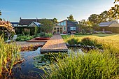 TYTHE BARN, OXFORDSHIRE, DESIGNER SARAH NAYBOUR: JUNE, WILDLIFE POND, DECKING, LAWN, POOL, WATER, WOODEN JACUZZI
