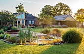 TYTHE BARN, OXFORDSHIRE, DESIGNER SARAH NAYBOUR: JUNE, WILDLIFE POND, DECKING, LAWN, POOL, WATER, WOODEN JACUZZI