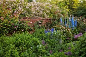 OLD BLADBEAN STUD GARDENS, KENT: JUNE, THE ROSE GARDEN, DELPHINIUMS, PAULS HIMALAYAN MUSK, ROSA SHROPSHIRE LAD, ROSA CONSTANCE SPRY, ALLIUMS, WALLED GARDEN