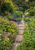 OLD BLADBEAN STUD GARDENS, KENT: JUNE, THE ROSE GARDEN, PATH, METAL SEAT, PHUOPSIS STYLOSA, ALLIUM CHRISTOPHII, SEDUMS, GERANIUM PRATENSE F ALBUM