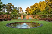 COTTESBROOKE HALL AND GARDENS, NORTHAMPTONSHIRE: THE POOL GARDEN, FOUNTAIN, WALLS, WHITE ROSES, ROSA CITY OF WINCHESTER