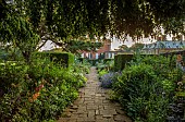 COTTESBROOKE HALL AND GARDENS, NORTHAMPTONSHIRE: THE TERRACE, ONOPORDUM ACANTHIUM, LUPIN MASTERPIECE, ALCHEMILLA MOLLIS, GERANIUM ORION