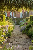 COTTESBROOKE HALL AND GARDENS, NORTHAMPTONSHIRE: THE TERRACE, ONOPORDUM ACANTHIUM, LUPIN MASTERPIECE, ALCHEMILLA MOLLIS, GERANIUM ORION