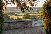 ROCKINGHAM CASTLE, NORTHAMPTONSHIRE: JUNE, VIEW FROM THE TERRACE TO LANDSCAPE BEYOND, BORROWED LANDSCAPE