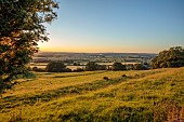 ROCKINGHAM CASTLE, NORTHAMPTONSHIRE: LANDSCAPE FROM THE TERRACE, JUNE, SUNSET