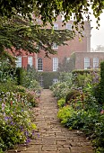 COTTESBROOKE HALL AND GARDENS, NORTHAMPTONSHIRE: THE TERRACE, DOUBLE HERBACEOUS BORDERS, ONOPORDUM ACANTHIUM, LUPINS, GERANIUMS