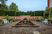 COTTESBROOKE HALL AND GARDENS, NORTHAMPTONSHIRE: THE MONKEY POOL, HYDRANGEA MACROPHYLLA MADAME EMILE MOUILLERE BESIDE THE POOL, WATER, WHITE BENCHES