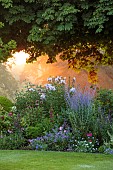 MORTON HALL GARDENS, WORCESTERSHIRE: SOUTH GARDEN, JULY, BORDER, SUNRISE, PEROVSKIA BLUE SPIRE, PHLOX, ECHINACEA