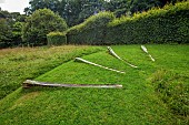 JUNE BLAKES GARDEN, IRELAND: WOODEN STEPS IN LAWN, HEDGES, HEDGING, PATHS