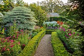 ROCKINGHAM CASTLE, NORTHAMPTONSHIRE: BORDERS, DAHLIA TOTALLY TANGERINE, PENSTEMON GARNET, COSMOS CORNUS CONTROVERSA VARIEGATA, VERBENA HASTATA BLUE SPIRES, PHLOX, HELENIUMS