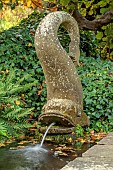 YORK GATE GARDEN, YORKSHIRE: AUTUMN, FALL,THE CANAL GARDEN, STONE FISH FOUNTAIN, RILL, WATER FEATURE