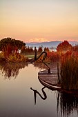 NATURAL SWIMMING POND GARDEN, ITALY BY GPT STUDIO, FALL, AUTUMN, OCTOBER, NATURAL SWIMMING POND, POOL, REFLECTIONS, SCULPTURE BY LEON BRONSTEIN