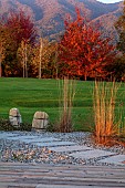NATURAL SWIMMING POND GARDEN, ITALY BY GPT STUDIO, AUTUMN, OCTOBER, GRAVEL, LAWN, STEPPING STONES, LIGHTS, STEPPING STONES