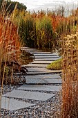 NATURAL SWIMMING POND GARDEN, ITALY BY GPT STUDIO, FALL, AUTUMN, OCTOBER, STONE SLABS, STEPPING STONES THROUGH GRAVEL, PATH