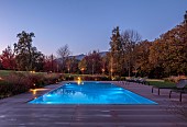 NATURAL SWIMMING POND GARDEN, ITALY BY GPT STUDIO, FALL, AUTUMN, OCTOBER, LIGHTS, LIGHTING, DECKING, DECKS, SWIMMING POOL, LANDSCAPE