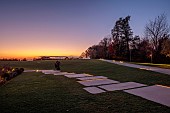 NATURAL SWIMMING POND GARDEN, ITALY BY GPT STUDIO, FALL, AUTUMN, OCTOBER, LIGHTING, LIGHTS, EVENING, NIGHT, PATH, LAWN, SCULPTURE BY LEON BRONSTEIN