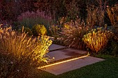 NATURAL SWIMMING POND GARDEN, ITALY BY GPT STUDIO, FALL, AUTUMN, OCTOBER, LIGHTING, LIGHTS, PATHS, PAVING, EUPHORBIA, MISCANTHUS, GRASSES