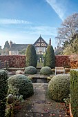 WOLLERTON OLD HALL, SHROPSHIRE: NOVEMBER, FROST, WINTER, VIEW OF HOUSE FROM THE LIME ALLEE, CLIPPED TOPIARY, YEW, BEECH HEDGES, HEDGING, POOL, POND, FORMAL, COUNTRY, GARDEN
