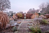 WOLLERTON OLD HALL, SHROPSHIRE: NOVEMBER, FROST, WINTER, LANHYDROCK GARDEN, PATH, GRASSES, WALLS, WOODEN BENCH, SEAT, HEDGES, HEDGING