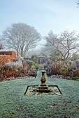 WOLLERTON OLD HALL, SHROPSHIRE: NOVEMBER, FROST, WINTER, STONE SUNDIAL, SUNDIAL GARDEN, FORMAL, COUNTRY