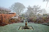 WOLLERTON OLD HALL, SHROPSHIRE: NOVEMBER, FROST, WINTER, STONE SUNDIAL, SUNDIAL GARDEN, FORMAL, COUNTRY
