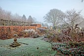 WOLLERTON OLD HALL, SHROPSHIRE: NOVEMBER, FROST, WINTER, STONE SUNDIAL, SUNDIAL GARDEN, FORMAL, COUNTRY