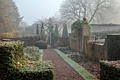WOLLERTON OLD HALL, SHROPSHIRE: NOVEMBER, FROST, WINTER, DECEMBER, PATHS, WALLS, CLIPPED TOPIARY YEW