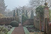 WOLLERTON OLD HALL, SHROPSHIRE: NOVEMBER, FROST, WINTER, DECEMBER, PATHS, WALLS, CLIPPED TOPIARY YEW