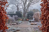 WOLLERTON OLD HALL, SHROPSHIRE: NOVEMBER, FROST, WINTER, HEDGES, HEDGING, LANHYDROCK, PATH, HEDGES, HEDGING, WOODEN BENCH, SEAT, GATE