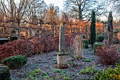 THE LASKETT GARDEN, HEREFORDSHIRE: WINTER, FROST, JANUARY, THE WILD GARDEN, OBELISK, THE SERPENTINE, CLIPPED TOPIARY, PLEACHED LIMES, TILIA PLATYPHYLLOS RUBRA, BEECH HEDGES